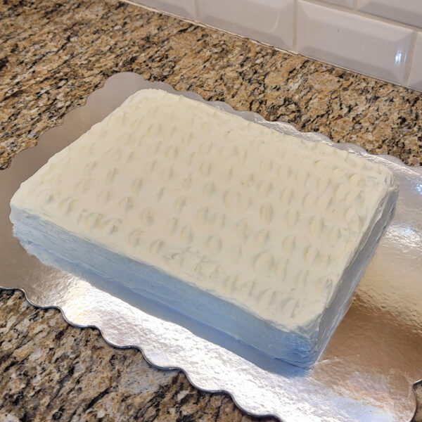 A cake that is sitting on top of a counter.